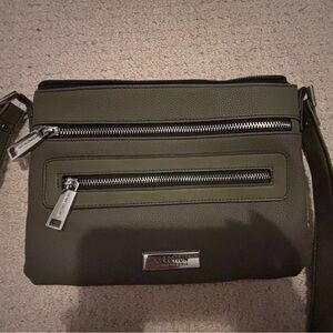 Dark green purse with long handbag strap